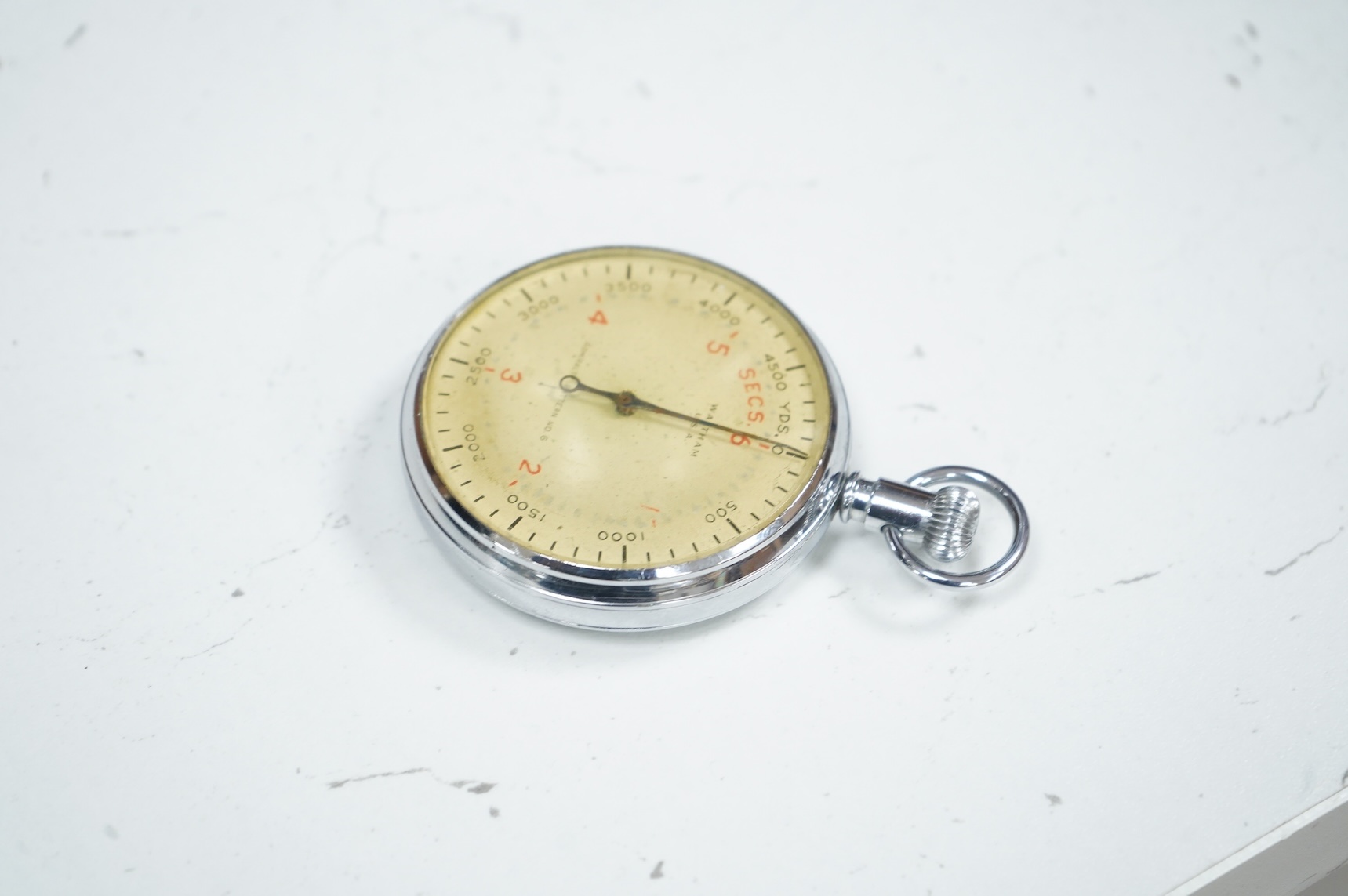 An Asdic military stopwatch by Waltham, U.S.A., Admiralty Pattern No.6, engraved to the reverse with broad arrow and; ‘Patt. 6, U12046’, retains inner dust cover